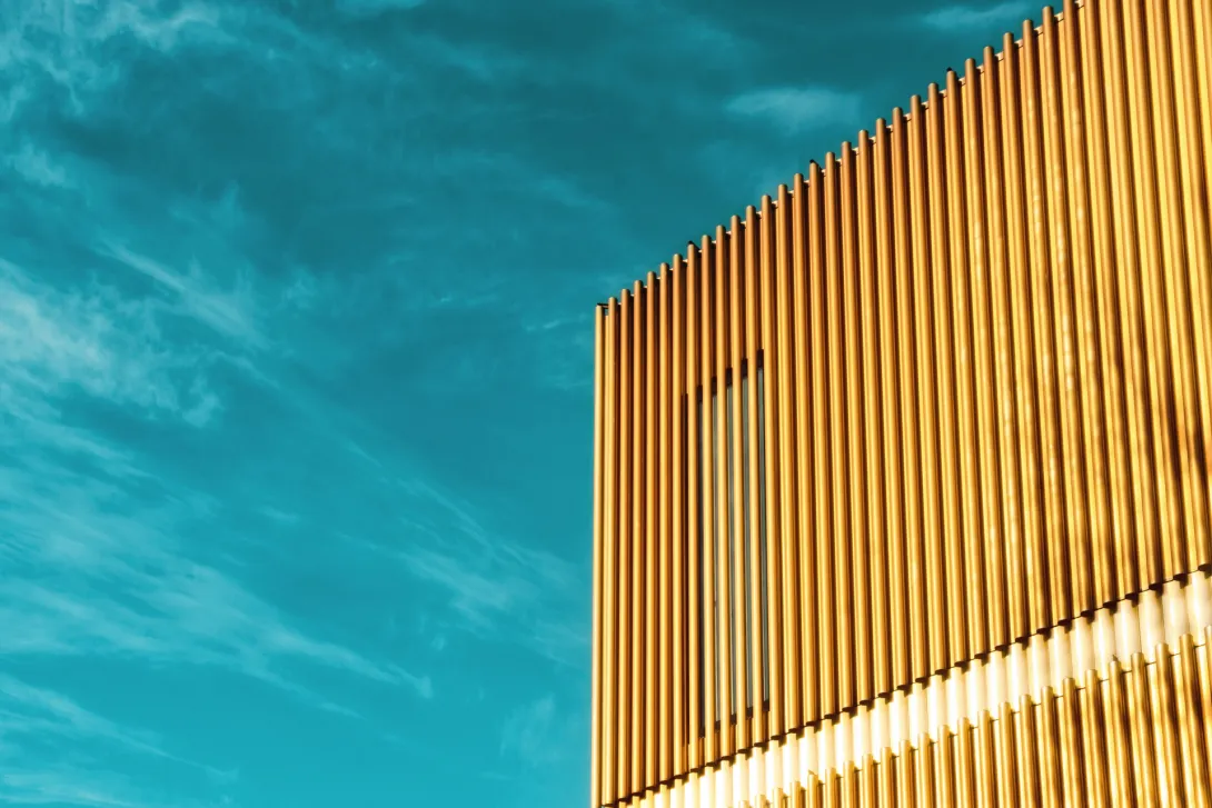 modern building with yellow metal structure