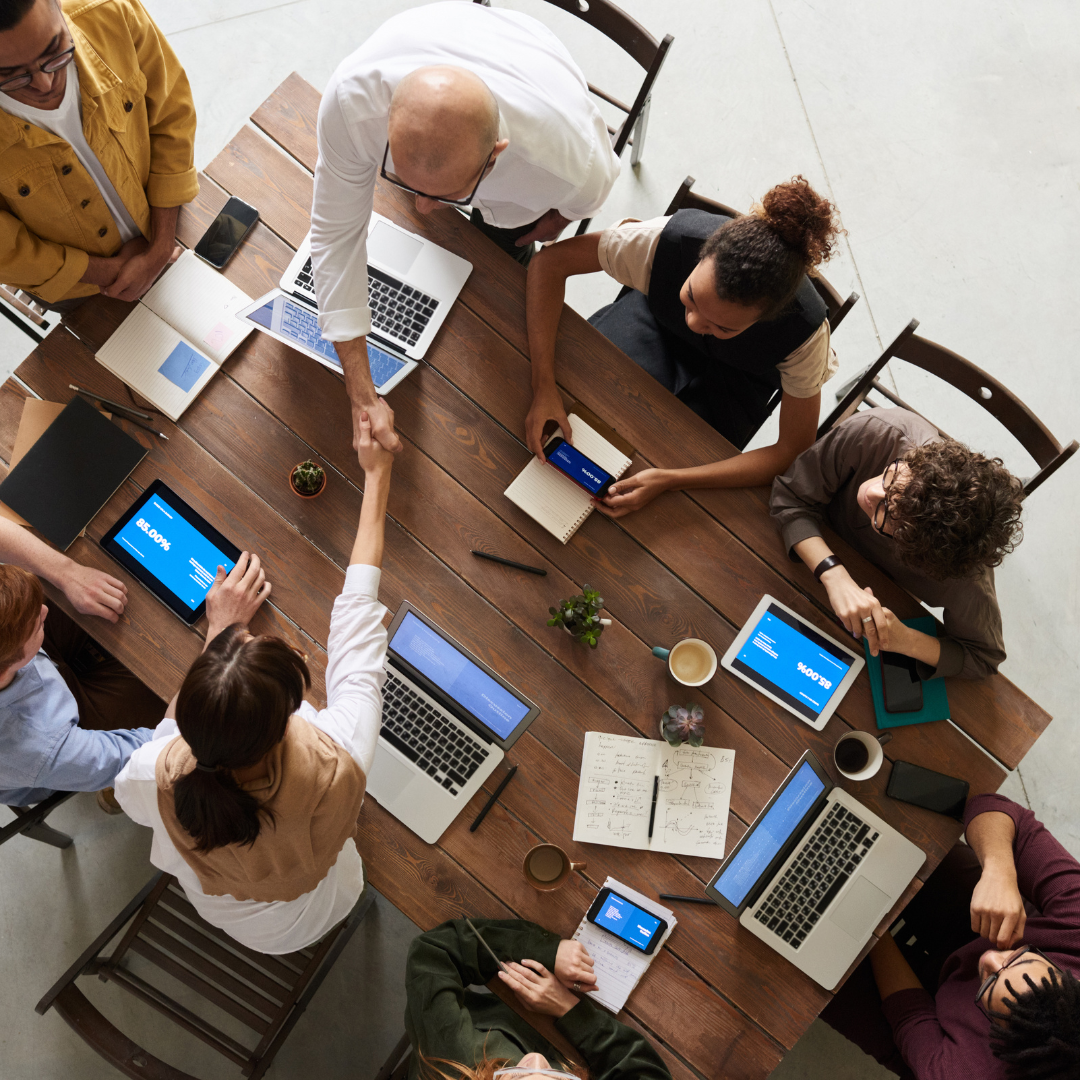 business meeting in an office using Drupal for CMS